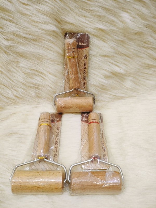 نشابة عجين خشب رولة